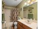 Bathroom with a bathtub and shower combination, featuring a vanity sink at 8533 Sw 93Rd Pl # C, Ocala, FL 34481