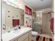 Bathroom featuring a shower with glass doors and a vanity sink at 8533 Sw 93Rd Pl # C, Ocala, FL 34481