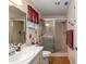 Bathroom showcasing a glass enclosed shower and tiled floors at 8533 Sw 93Rd Pl # C, Ocala, FL 34481