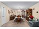 Dining area with traditional table, chairs, and decorative furnishings at 8533 Sw 93Rd Pl # C, Ocala, FL 34481