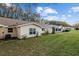 Exterior view showcasing the backyard and neighboring homes in the community at 8533 Sw 93Rd Pl # C, Ocala, FL 34481