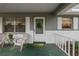 Inviting front porch with cozy seating, decorative touches, and a welcoming entrance at 8533 Sw 93Rd Pl # C, Ocala, FL 34481