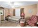 Living room with tile floor, ceiling fan, sofa, and decor at 8533 Sw 93Rd Pl # C, Ocala, FL 34481