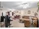 A spacious living room with plenty of seating and natural light at 8533 Sw 93Rd Pl # C, Ocala, FL 34481