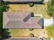 Aerial view of a single-story home with a well-maintained roof and green lawn in a residential neighborhood at 9346 Sw 73Rd St, Ocala, FL 34481