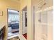 Ensuite bathroom featuring a glass shower and a doorway leading to a walk-in closet at 9346 Sw 73Rd St, Ocala, FL 34481