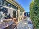 Charming patio features comfortable seating and a dining table, ideal for outdoor entertaining and relaxation at 9346 Sw 73Rd St, Ocala, FL 34481