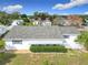 Aerial view shows the home's roof and surrounding landscaping in a tranquil neighborhood at 9886 Se 178Th Ln, Summerfield, FL 34491