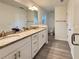 Spacious bathroom featuring dual sinks, granite countertop, and modern fixtures for a luxurious feel at 1370 Sw Obee Ridge Rd, Dunnellon, FL 34432
