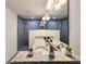 Bathroom featuring double sinks, granite countertops, decorative plants, and a glass-enclosed shower at 1370 Sw Obee Ridge Rd, Dunnellon, FL 34432