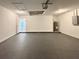 Clean and spacious garage with epoxy flooring and ample storage space at 1370 Sw Obee Ridge Rd, Dunnellon, FL 34432