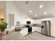 Bright kitchen boasts stainless appliances, stylish countertops, and an open concept layout at 1370 Sw Obee Ridge Rd, Dunnellon, FL 34432