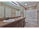 Spacious bathroom featuring dual sinks, a soaking tub and a large mirror at 1645 Sw 168Th Loop, Ocala, FL 34473