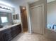 The bathroom features dual sinks, a shower and a soaking tub at 1645 Sw 168Th Loop, Ocala, FL 34473