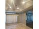 Dining room with tray ceiling, chandelier, window with blinds and tile floors at 1645 Sw 168Th Loop, Ocala, FL 34473