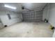 Empty garage with high ceilings and automatic door opener at 1645 Sw 168Th Loop, Ocala, FL 34473