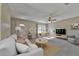 Bright and airy living room with carpeted floors, neutral walls, and modern furnishings at 1645 Sw 168Th Loop, Ocala, FL 34473