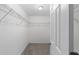 Walk-in closet with wire shelving, carpeted floor and ample space at 17672 Sw 112Th Ln, Dunnellon, FL 34432