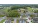 Aerial view of the community with trees and community amenities at 1902 Se 37Th Court Cir, Ocala, FL 34471