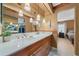 Bathroom featuring a double sink, modern fixtures, and neutral colors at 1902 Se 37Th Court Cir, Ocala, FL 34471