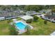 Community pool area featuring a covered pavilion with seating and well-maintained landscaping at 1902 Se 37Th Court Cir, Ocala, FL 34471