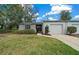 Charming one-story home with a well-maintained lawn and attached garage in a desirable neighborhood at 1902 Se 37Th Court Cir, Ocala, FL 34471