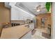 Bright kitchen featuring modern appliances, ample counter space, and stylish tile flooring, perfect for cooking at 1902 Se 37Th Court Cir, Ocala, FL 34471
