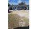 Newly constructed one-story home featuring a stucco exterior, contrasting trim, and an attached garage at 1929 Sw 7Th Pl, Ocala, FL 34474