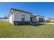 Corner view of home showing manicured lawn and landscaping details at 3352 Sw 127Th Lane Rd, Ocala, FL 34473