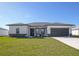 Charming single-story home with a well-maintained lawn and two car garage at 3352 Sw 127Th Lane Rd, Ocala, FL 34473