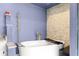 Modern bathroom showcasing a freestanding tub, stone accents, and elegant fixtures at 3621 Sw 52Nd Ter, Ocala, FL 34474