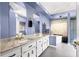 Luxurious bathroom with double sinks, granite countertops, and a separate tub and shower at 3621 Sw 52Nd Ter, Ocala, FL 34474