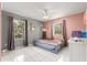 Charming bedroom featuring tile floors, natural light, with soothing colors for a restful retreat at 3621 Sw 52Nd Ter, Ocala, FL 34474