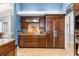 Gourmet kitchen with custom cabinetry, granite countertops, stainless steel appliances, and tile flooring at 3621 Sw 52Nd Ter, Ocala, FL 34474