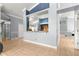 Open living space with view to kitchen, tile floors, and elegant architectural details at 3621 Sw 52Nd Ter, Ocala, FL 34474