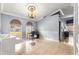 Spacious living room featuring arch windows and decorative ceiling, perfect for a home office or relaxation at 3621 Sw 52Nd Ter, Ocala, FL 34474