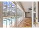Enclosed patio with travertine floors, ceiling fans, and view to the sparkling pool at 3621 Sw 52Nd Ter, Ocala, FL 34474