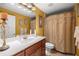 Bathroom with a vanity, large mirror, and shower with decorative curtain at 4320 Sw 112Th St, Ocala, FL 34476