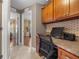 Cozy office nook with wood cabinets, drawers and desk with openings to the bedrooms and living room at 4320 Sw 112Th St, Ocala, FL 34476