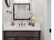 Elegant bathroom featuring a modern vanity with a sleek countertop and stylish fixtures at 4384 Pezzullo Cir, The Villages, FL 32163