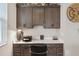 Cozy home office setup with modern cabinets, drawers, and white countertops for a functional workspace at 4384 Pezzullo Cir, The Villages, FL 32163