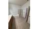Bathroom showing tile floors, tub, and shower at 4954 Sw 40Th Pl, Ocala, FL 34474