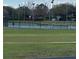 Community tennis courts with well-maintained grounds at 4954 Sw 40Th Pl, Ocala, FL 34474