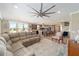 Spacious living room, adjoining kitchen and dining areas, offers an ideal space for entertaining at 5111 Nw 35Th Pl, Ocala, FL 34482