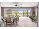 Inviting outdoor patio with comfortable seating and serene golf course views, perfect for relaxation and entertaining at 5111 Nw 35Th Pl, Ocala, FL 34482