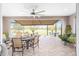 Comfortable patio with dining and seating areas, beautiful view of golf course at 5111 Nw 35Th Pl, Ocala, FL 34482