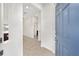 Bright foyer showcasing tile flooring and a glimpse into the home's interior layout at 5870 Sw 93Rd Cir, Ocala, FL 34481