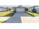 Beautiful single-Gathering home boasting a well-kept lawn and a large driveway leading to a two-car garage at 5870 Sw 93Rd Cir, Ocala, FL 34481