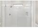 Modern shower with white subway tile, shower niche and frameless glass door at 5870 Sw 93Rd Cir, Ocala, FL 34481