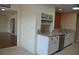 Updated kitchen featuring granite countertops and stainless steel appliances, offering modern convenience at 6548 Sw 84Th Place Rd, Ocala, FL 34476